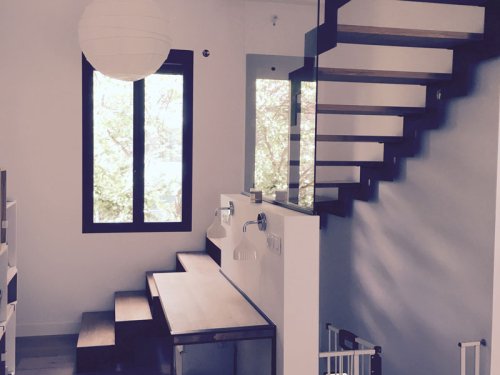 Escalier sur limon central